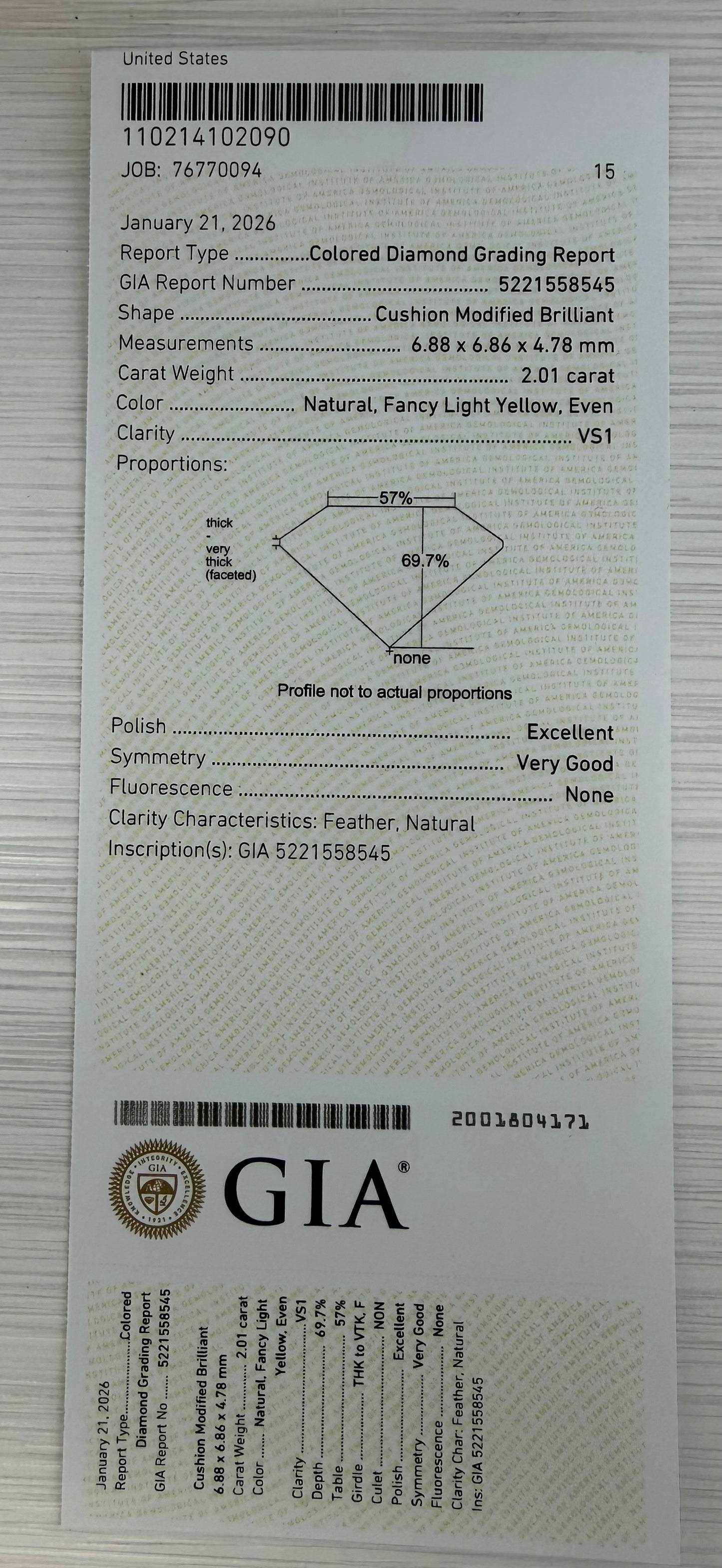 Double Halo Ring in 14kt. White Gold with 2 carat Natural Mined GIA Fancy Light Yellow Cushion with Round Diamonds on the band.