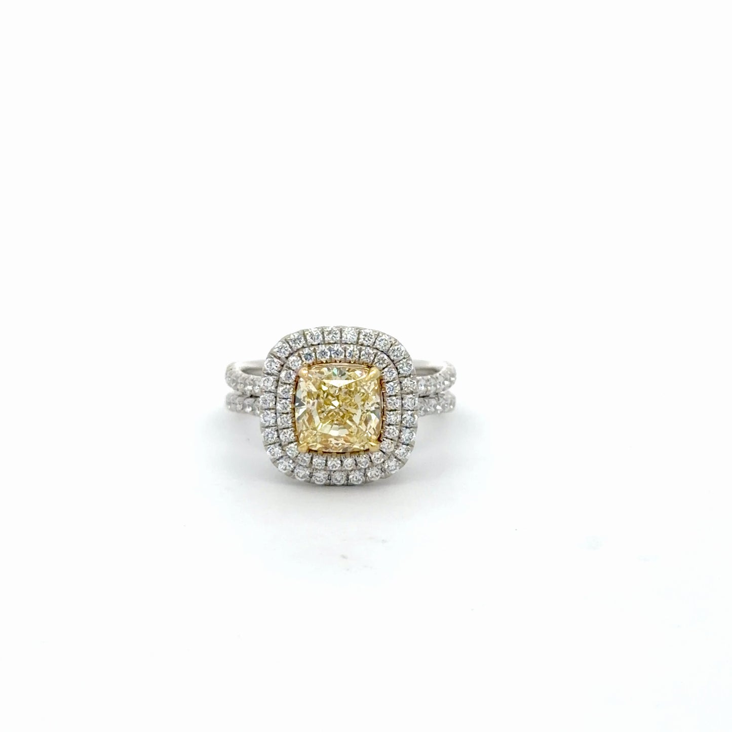 Double Halo with Fancy Light Yellow 2 carat Cushion Modified Brilliant.
