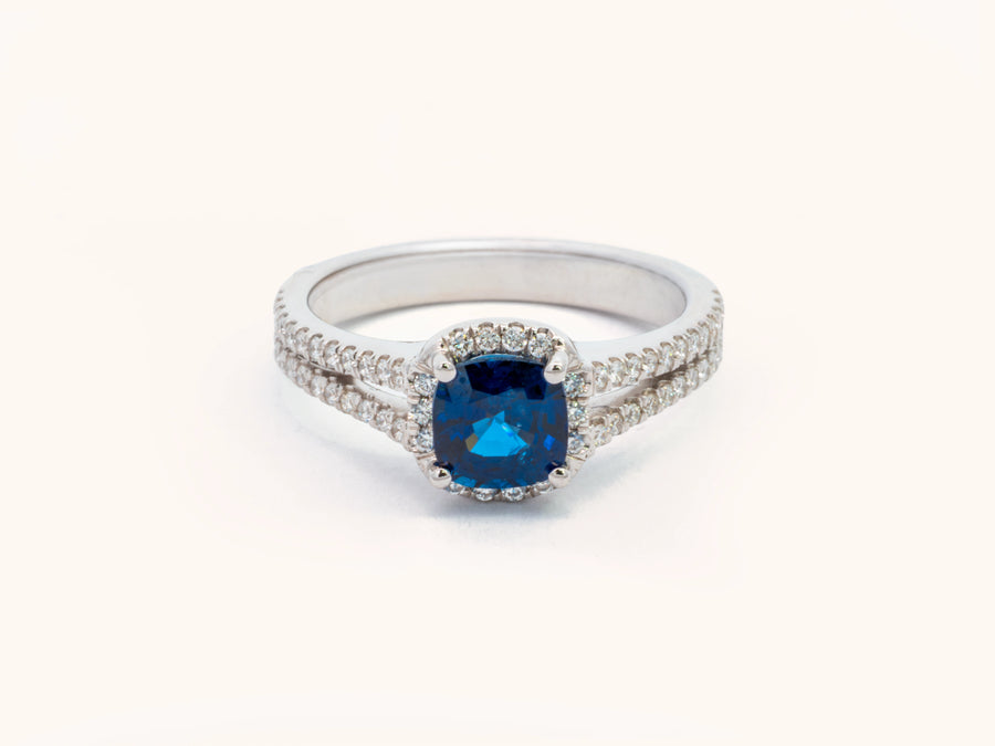 Cushion-Cut Blue Sapphire and Diamond Halo Ring in Platinum