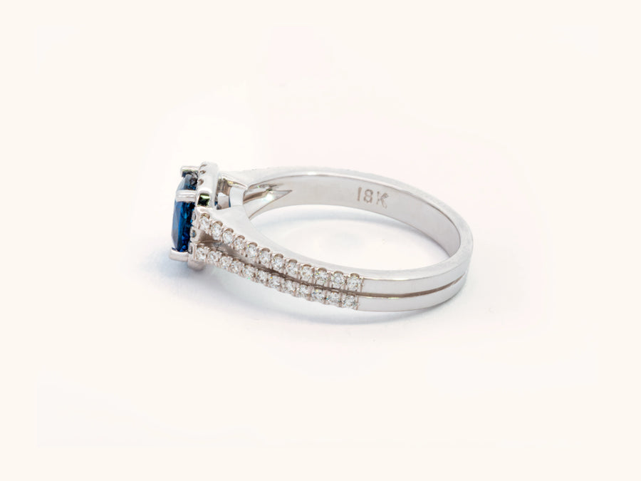 Cushion-Cut Blue Sapphire and Diamond Halo Ring in Platinum