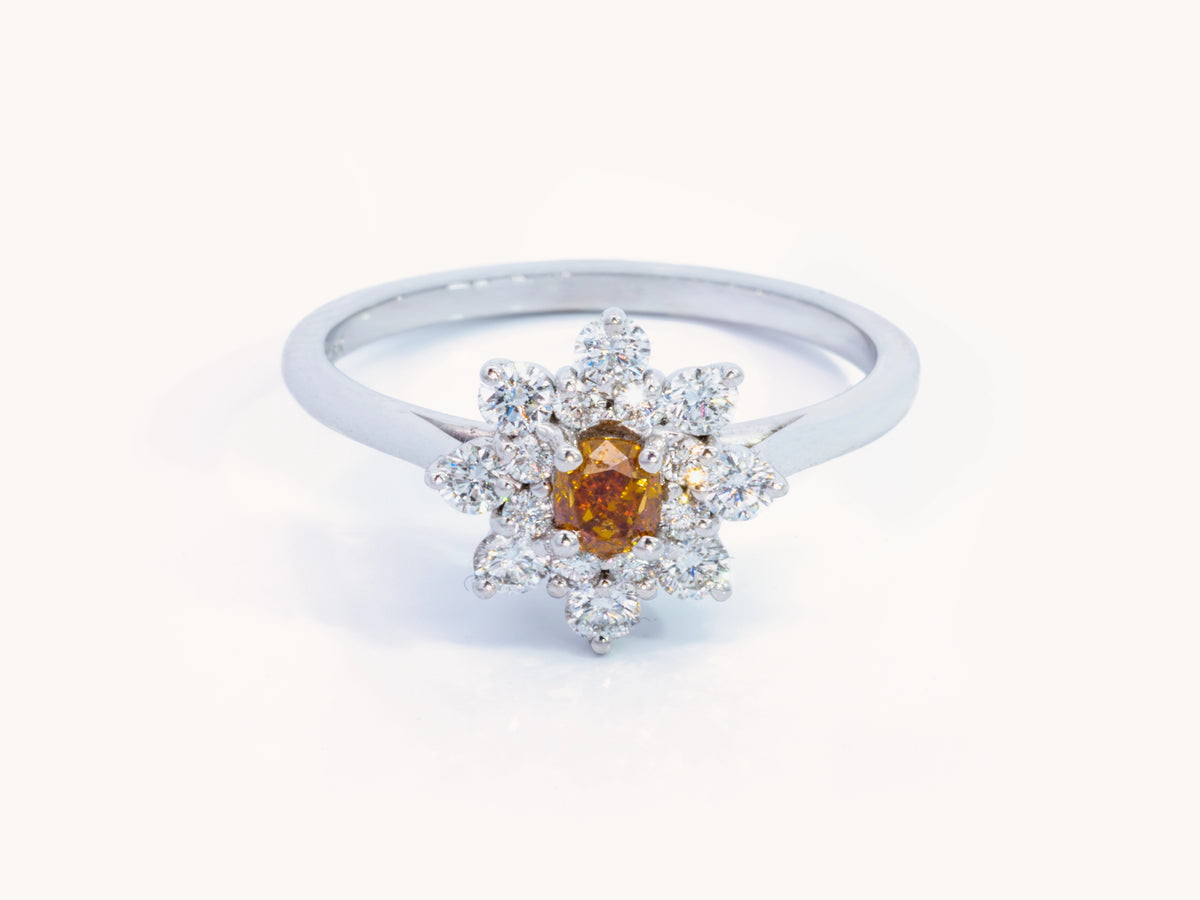 Fancy Deep Yellowish Orange Cushion Diamond Halo Ring in 18K White Gold