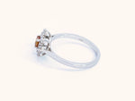 Fancy Deep Yellowish Orange Cushion Diamond Halo Ring in 18K White Gold