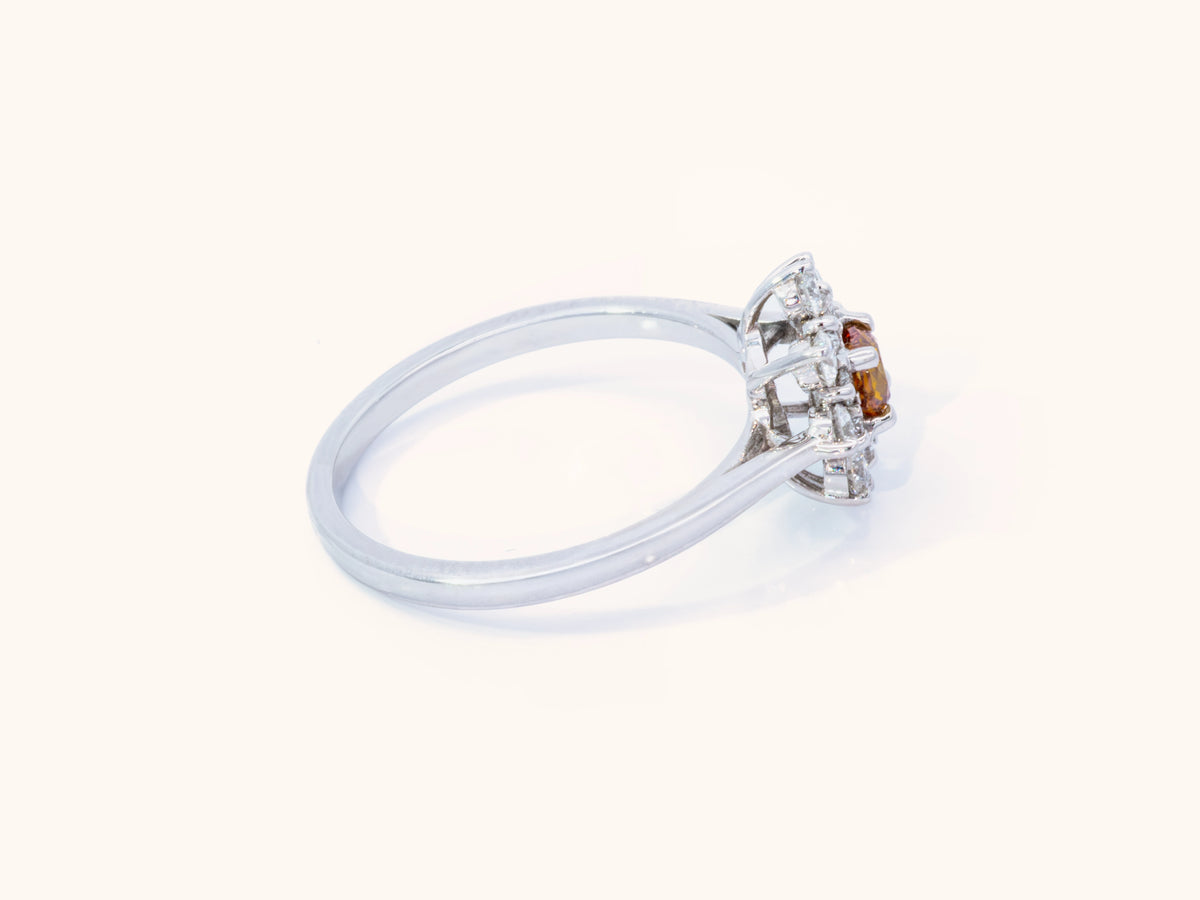 Fancy Deep Yellowish Orange Cushion Diamond Halo Ring in 18K White Gold