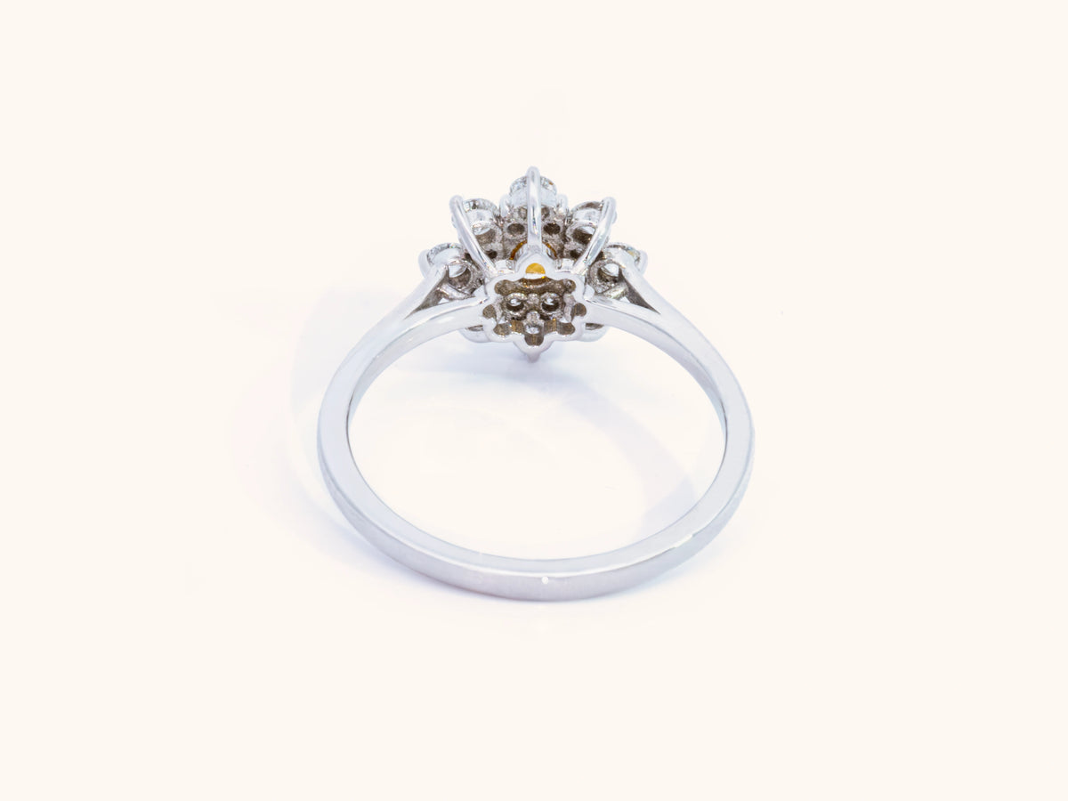 Fancy Deep Yellowish Orange Cushion Diamond Halo Ring in 18K White Gold