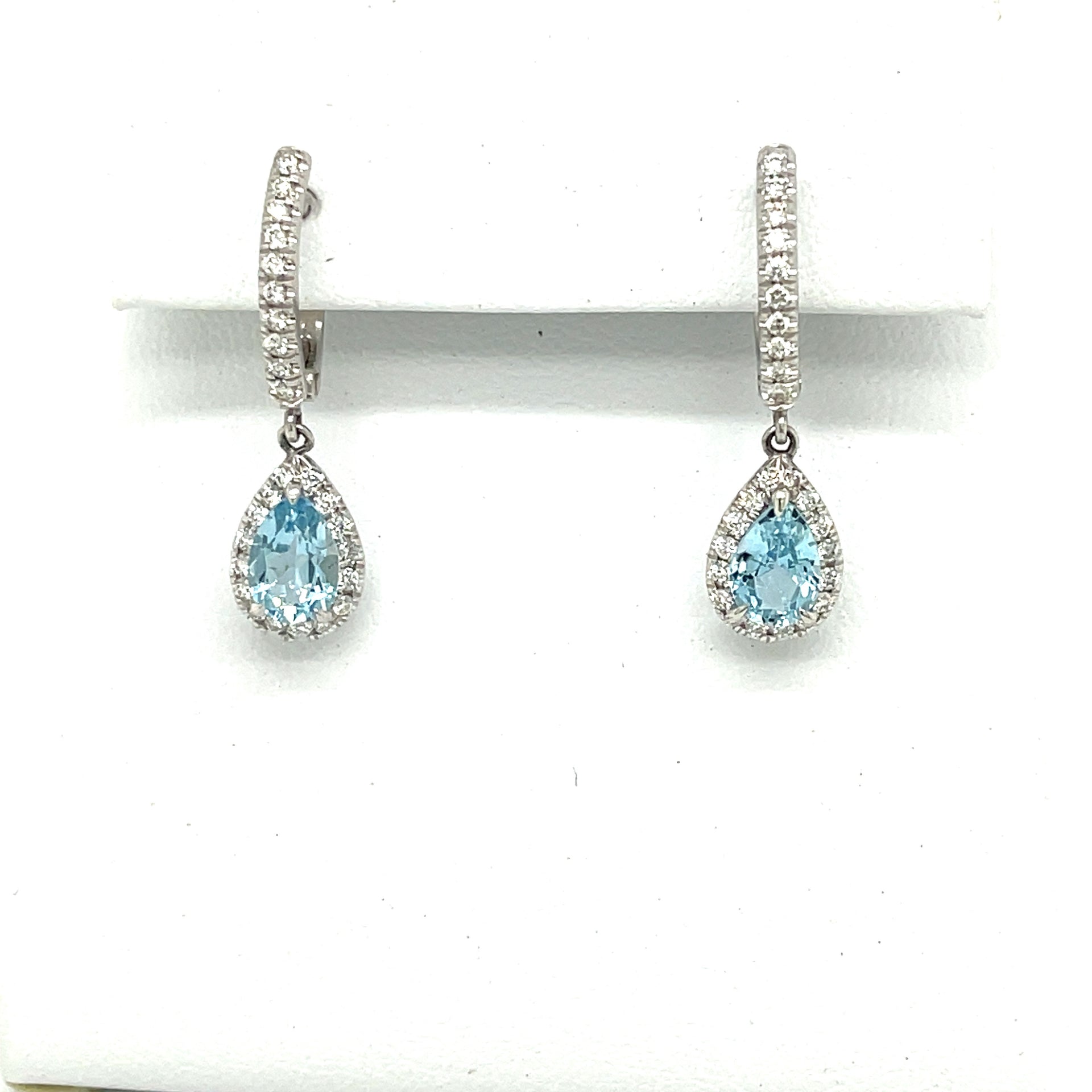 18 kt.  White Gold Aquamarine and Diamond Halo Earrings