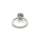 Oval Ceylon Sapphire set in Diamond Halo Ring - FlawlessCarat