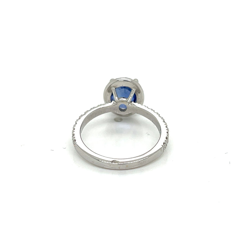Oval Ceylon Sapphire set in Diamond Halo Ring - FlawlessCarat