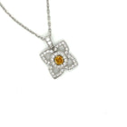 18 Karat White Gold Flower Pendant with a Natural Orange Yellow Radiant Center Diamond and Fine White Round Diamond Accents - FlawlessCarat